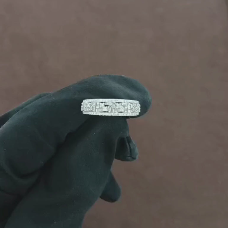 Video showcasing a 0.30 carat natural round diamond ring with tapered baguette-cut diamonds, capturing sparkle and detail from all angles.
