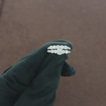 Load and play video in Gallery viewer, Close-up view of two luxurious twin rings featuring 1.54-carat natural round-cut diamonds, sparkling under soft lighting. The rings are set in elegant metal bands, highlighting their brilliance and timeless design. 
