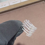 Load and play video in Gallery viewer, Video showcasing the 0.58 CT natural round cut spiral diamond ring set in 18kt white gold, highlighting the unique spiral design and the sparkling brilliance of the round diamonds from different angles.
