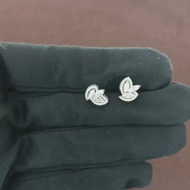 Discover the 0.71 CT Natural Diamond Stud Earrings, crafted in 18K White Gold, with an exquisite combination of round and marquise diamonds. Perfect for marking engagements, anniversaries, or unforgettable moments